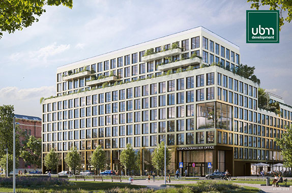 UBM ESG-Fokus Modernes Gebäude der UBM Development AG mit nachhaltiger Architektur und großen Fensterfronten, passend zur Kampagne "ESG im Fokus".
